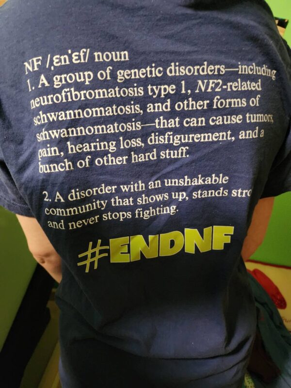No One Fights Alone with NF Definition on Back